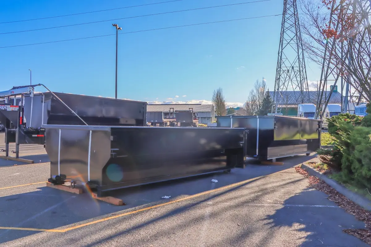 Roll-off dumpster ready for waste disposal at job site for Construction Dumpster Rental in Houghton